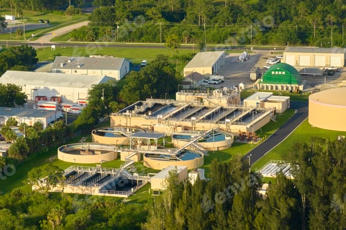 Preview: Aerial view of modern water cleaning facility at urban wastewater treatment plant.