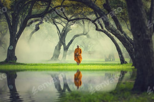 Preview: Monk hike in deep forest reflection with lake, Buddha Religion concept