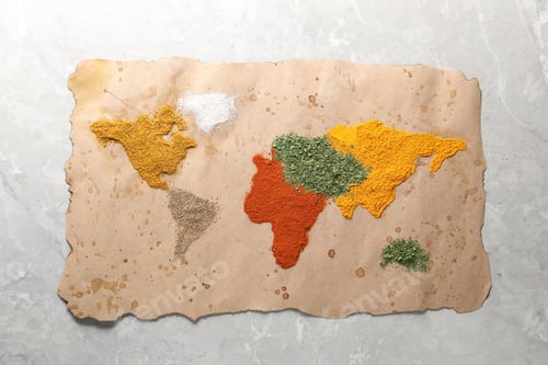 Preview: World map of different spices on light grey marble table, top view