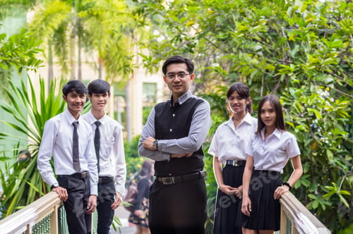 Preview: Portrait of Asian teacher and College Students in park, University education concept
