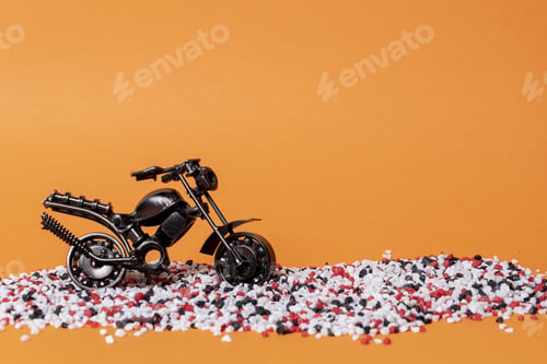 Preview: toy model of a sports motorcycle on an orange background