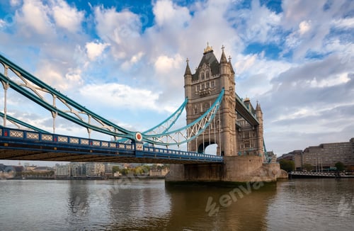 Preview: Historic Bridge over River Thames and Cityscape Skyline during dramatic sunrise.