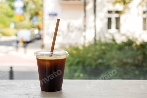 Preview: Cold brew black iced coffee on the windowsill