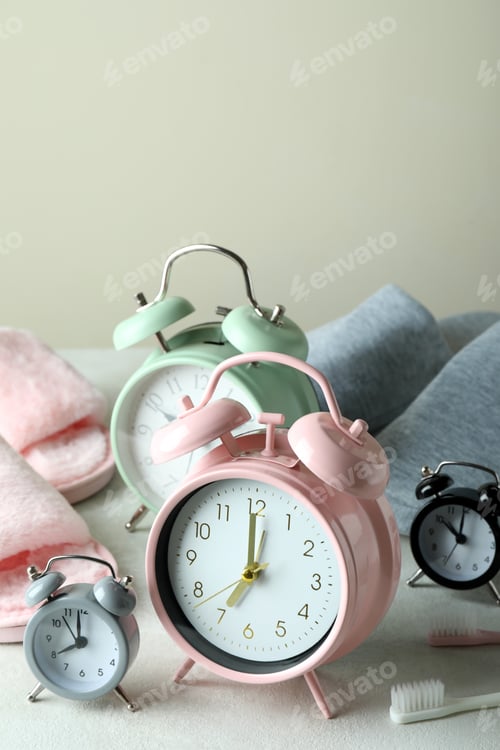 Preview: Different sleep routine accessories on white textured table