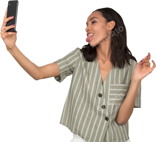 Preview: Cheerful Woman Posing for a Fun Phone Selfie
