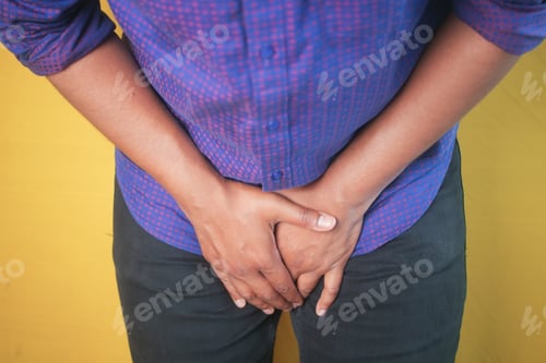 Preview: the concept of prostate and bladder problem, crotch pain of a young person
