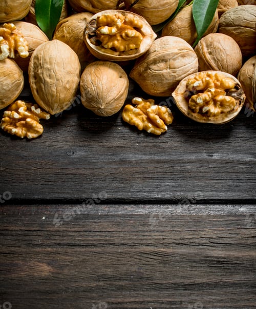Preview: Peeled walnut with leaves .