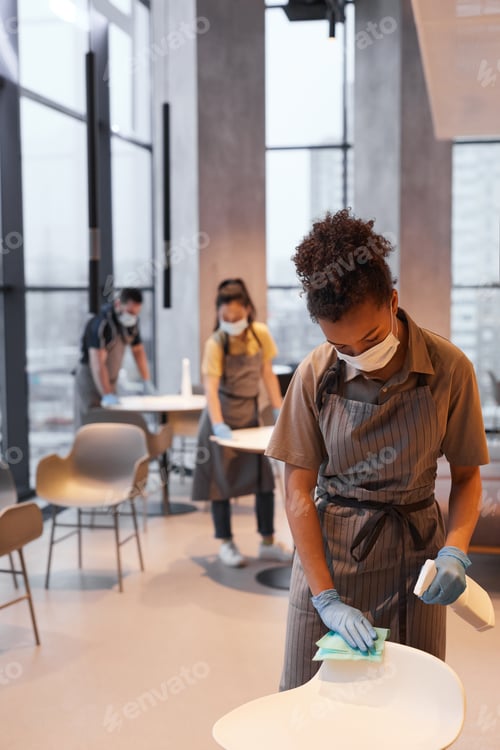 Preview: Young Woman Cleaning Cafe