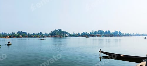 Preview: Fleet of boats sailing together across a vast expanse of a lake