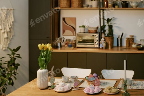 Preview: Easter Table Setting Featuring Sweets and Decorations in Cozy Kitchen