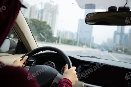 Preview: People driving car on city road