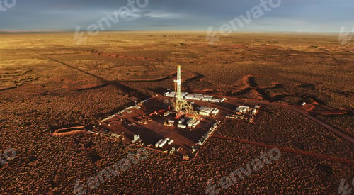 Preview: Aerial shot of hydraulic fracturing equipment on a brown field