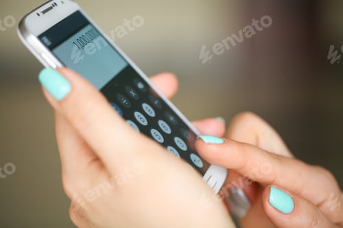 Preview: Woman hands working on calculator close up