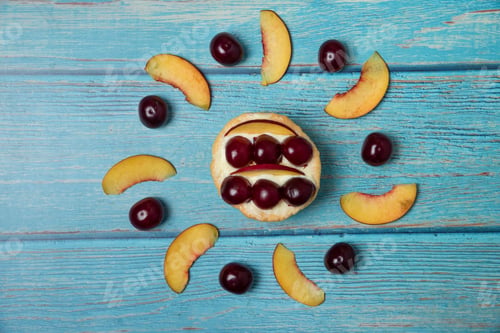 Preview: Top view of fresh fruit salad on blue wooden background