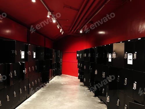 Black Lockers Inside a Red Room