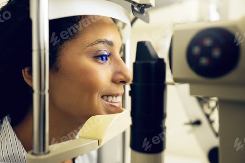 Preview: Woman, eye exam and optometry for vision, medical and healthcare consultation or glaucoma check. Ha