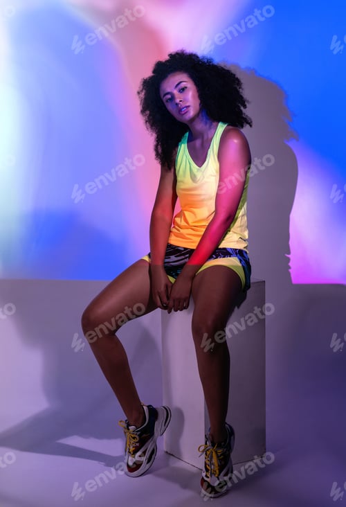 Preview: Alluring ethnic female in activewear