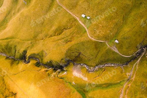 Preview: Aerial view of a little pathway crossed by a crevasse
