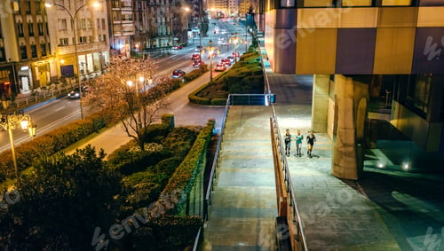 Preview: Women friends runners training together on the city at night