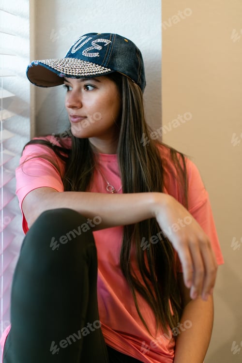 Preview: Woman looking out the window