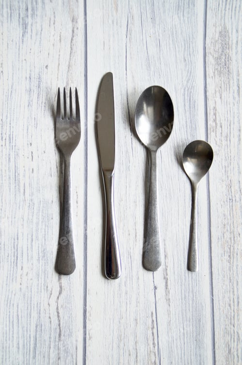 Preview: cutlery set of 4 items on light wood