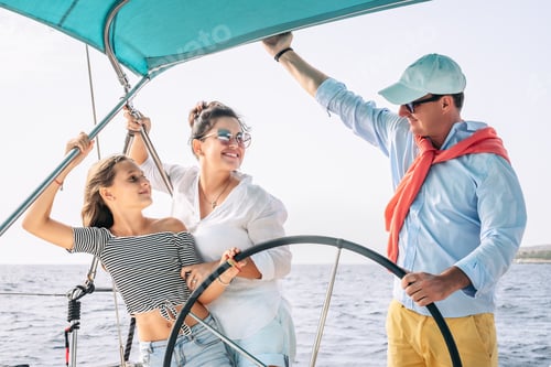 Preview: Happy family having fun on sailboat vacation