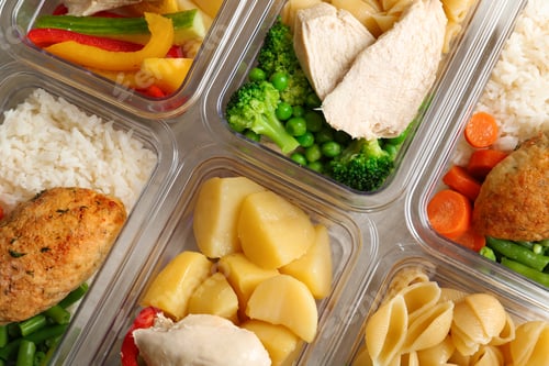 Preview: Boxes with prepared meals as background, flat lay
