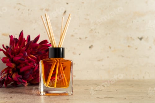 Preview: Home fragrance diffuser on a table with a decorative flower nearby
