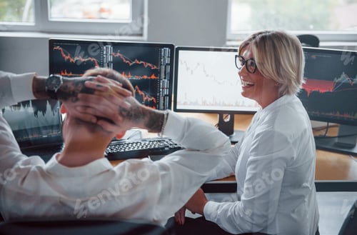 Preview: Talking to each other. Two stockbrokers in formal clothes have a break in the office