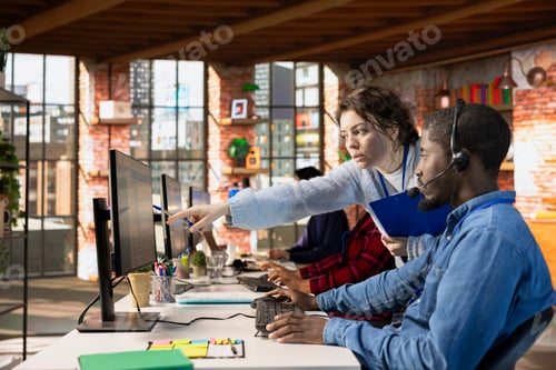 Preview: Customer service manager teaching new worker how to track support tickets