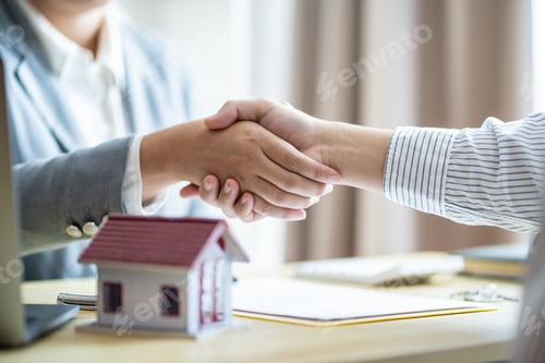 Preview: Businessman shaking hands successful making a deal. mans handshake. Business partnership Real estate