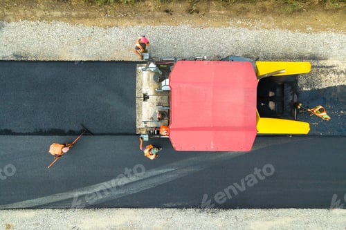 Preview: Aerial view of new road construction with asphalt laying machinery at work