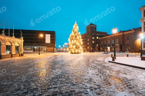Preview: Riga, Latvia. Winter Night View Of Christmas Tree At Evening In Night Illuminations Lights. New Year