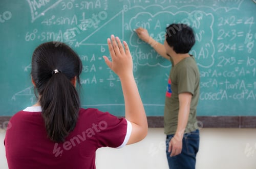 Preview: Raised hands in classroom at School