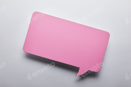 Preview: top view of empty pink speech bubble on grey background