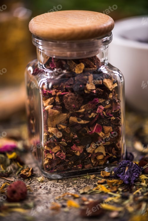 Preview: Tea with dried flowers and fruits in jar