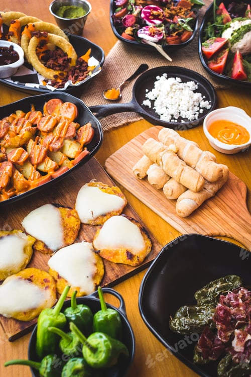 Preview: Served snacks and dishes on table