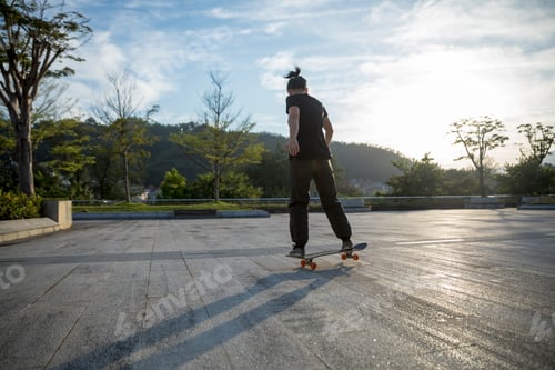 Preview: Skateboarder skateboarding outdoors in city