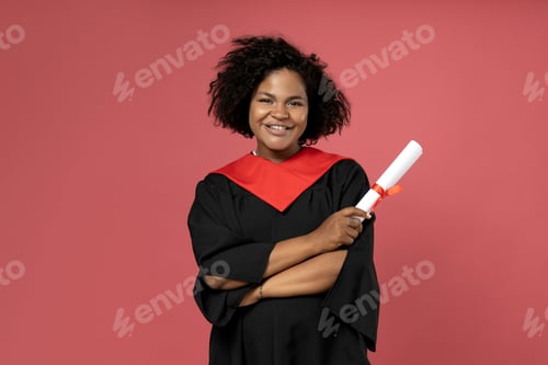 Preview: A young African American woman in a graduation uniform