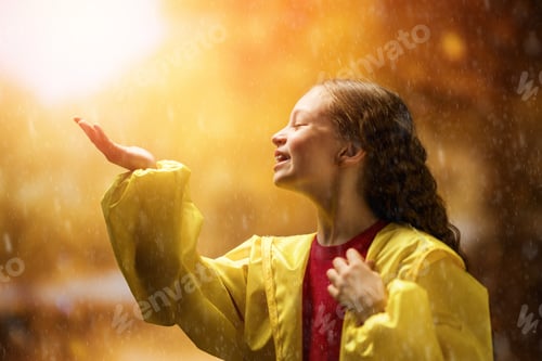 Preview: girl in the rain on an autumn walk