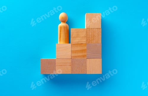 Preview: Top view of wooden toy blocks on blue
