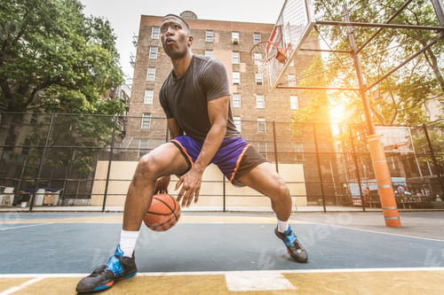 Preview: Basketball player training outdoors