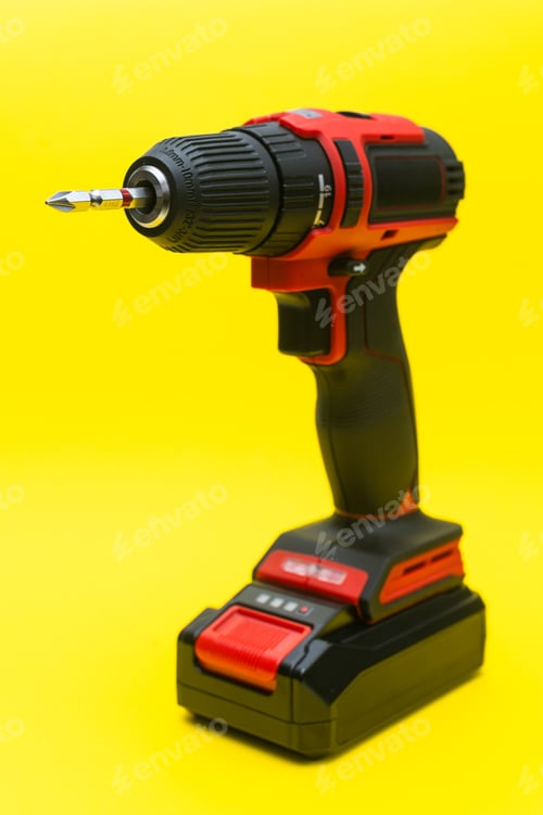 Preview: Red and Black Cordless Drill on Yellow Background