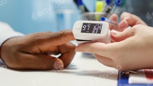 Preview: Medical specialist takes oxygen saturation measurement and checking vital signs