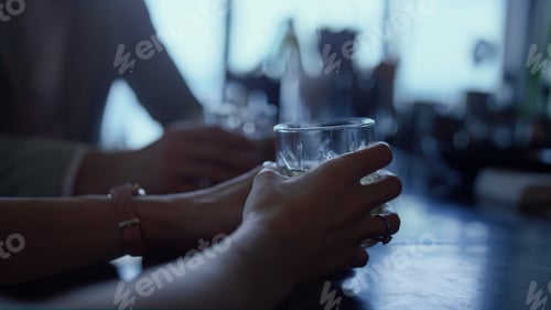 Preview: Couple hands drinking gin tonic in bar closeup. Unknown man woman dating in cafe