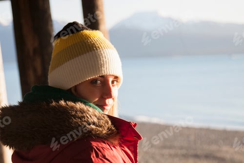 Preview: Young woman wearing knit hat
