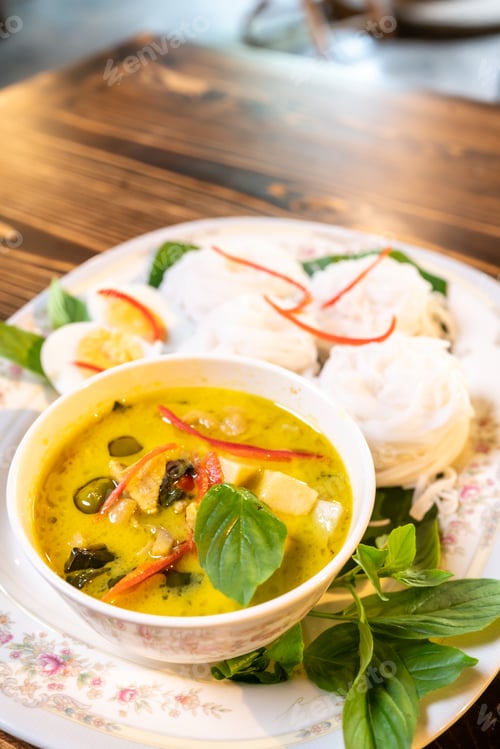 Preview: Thai style food, green curry with chicken, delicious vegetable Asian dinner