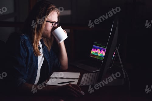 Preview: Guy working with computer