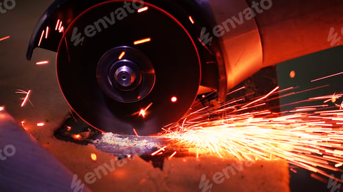 Preview: Cutting metal with disc grinder with bright sparks