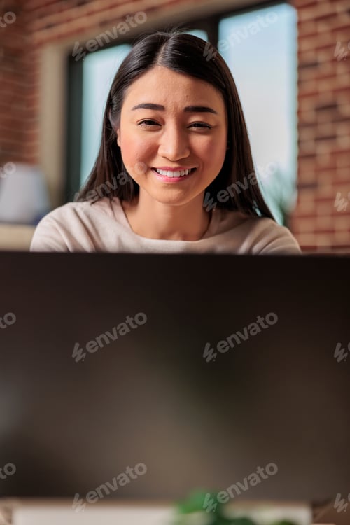 Preview: Successful authentic asian female freelancer